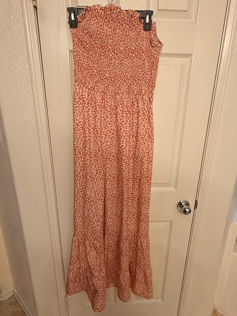 Smocked floral Jump suit.  Spaghetti strap ties